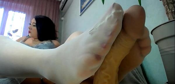  Hot footjob from lady in sexy white stokinghs